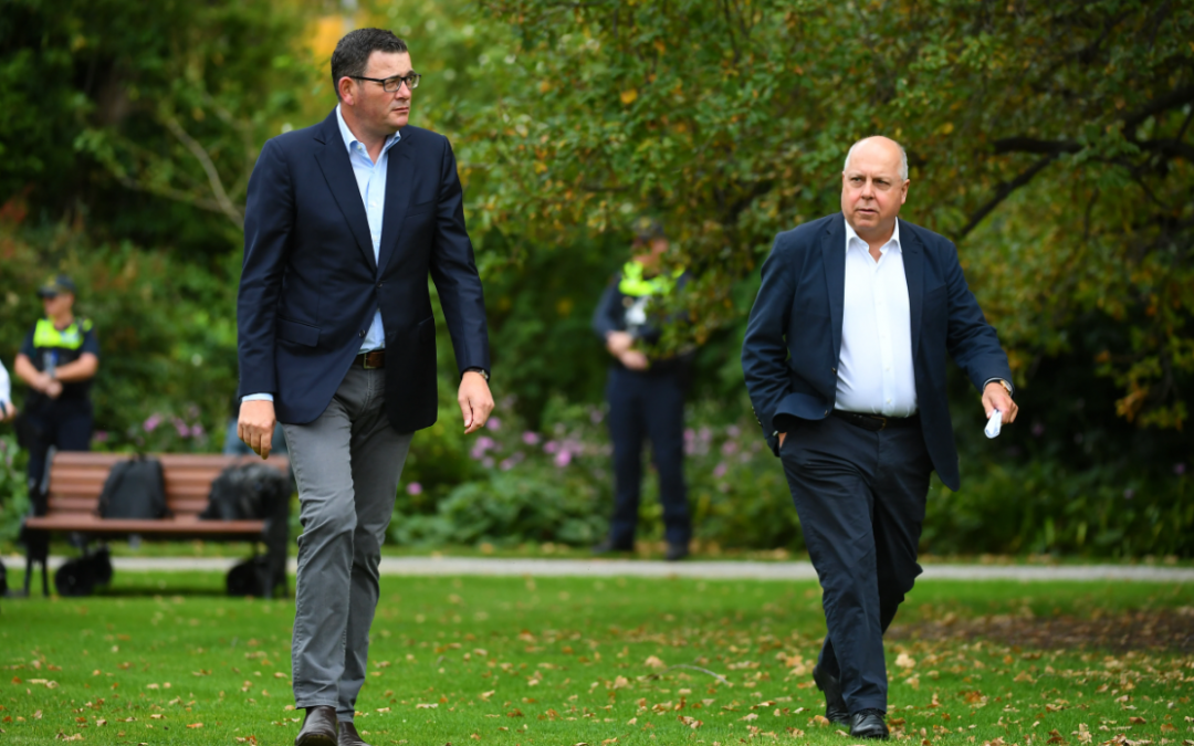 Premier Daniel Andrews walking with State Treasurer TIm Pallas